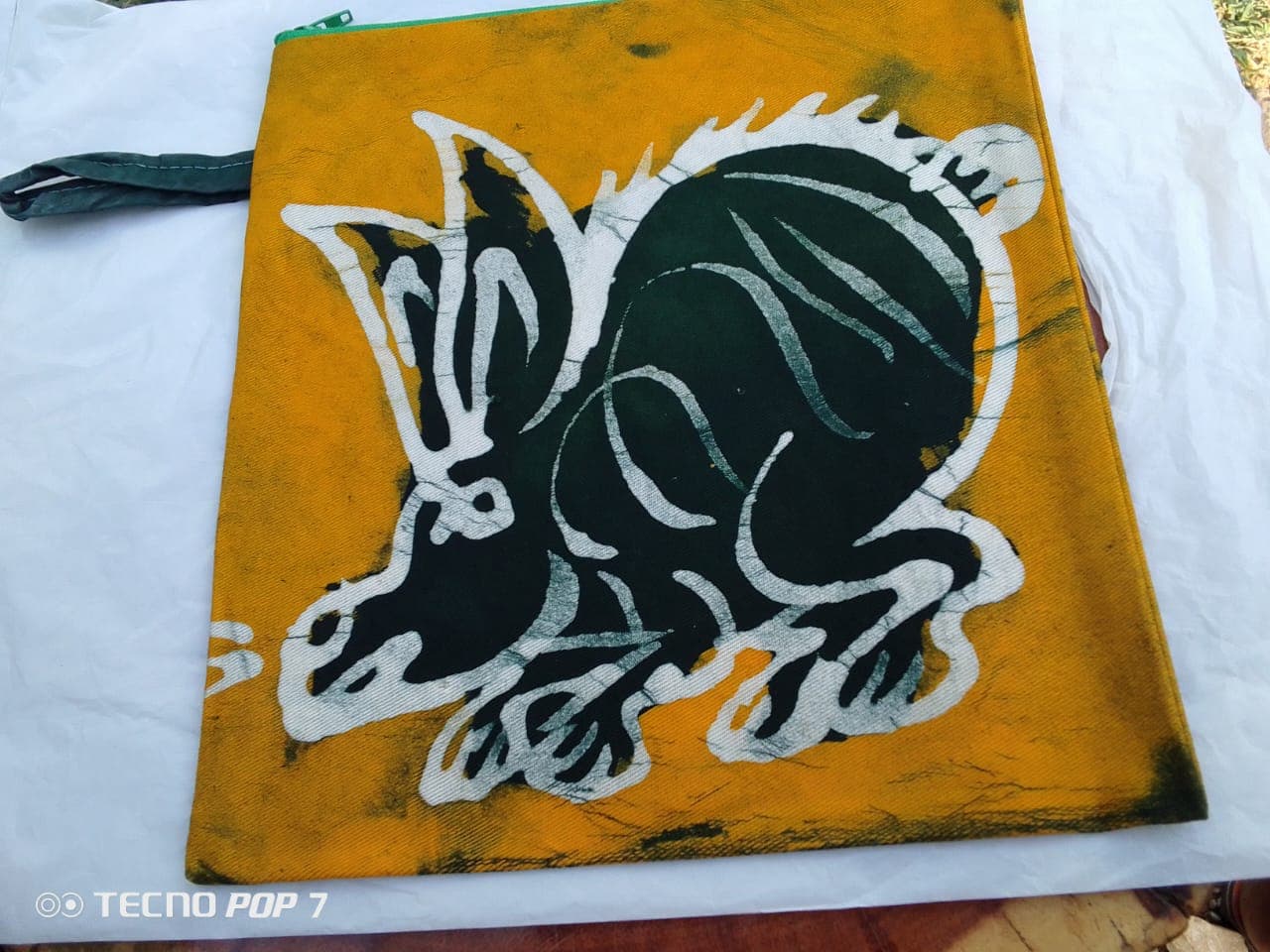 Batik makeup bag with dark green rabbit print – Yellow batik makeup bag with green zipper