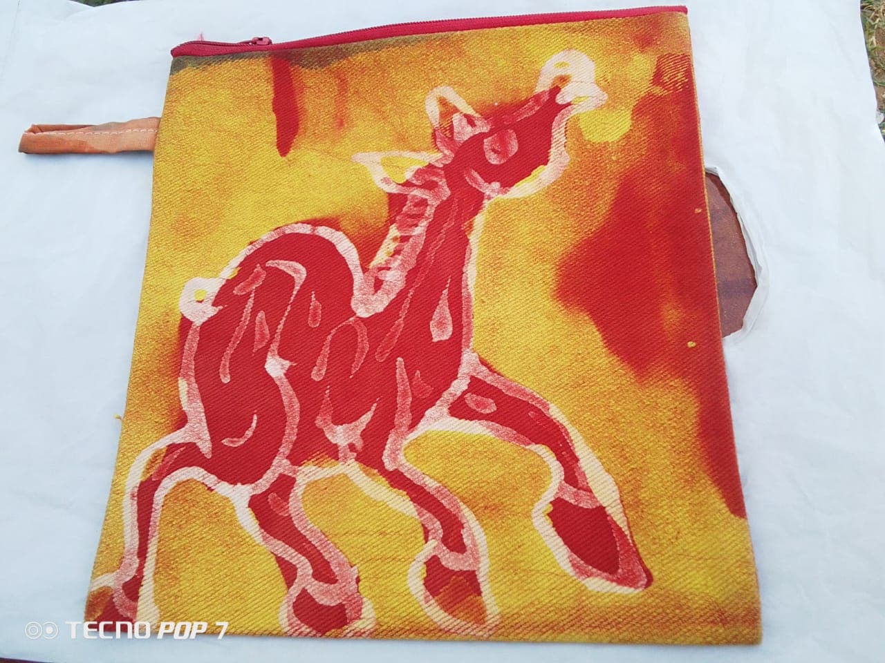 Batik makeup bag with horse print – Red orange and yellow tie-die batik makeup bag with horse pattern