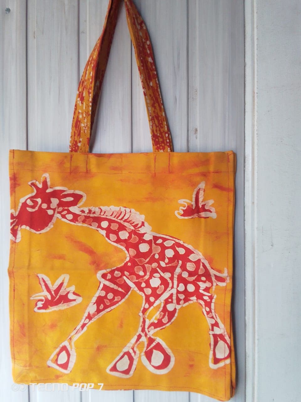 Batik tote bag with giraffe print – Orange batik tote bag with red giraffe print